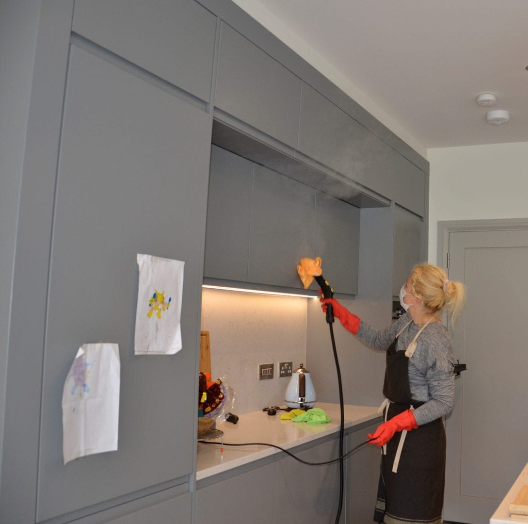 An Ecoleen cleaner using a professional steamer