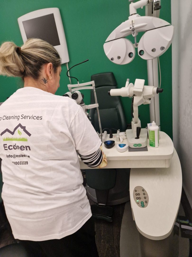 An Ecoleen cleaner wiping down equipment in a Dublin clinic