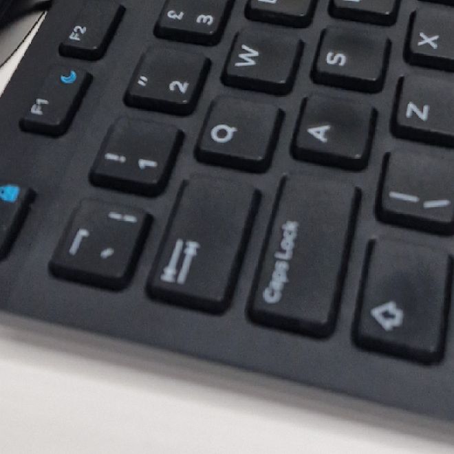 The same keyboard after cleaning, with the dust cleared from between the keys